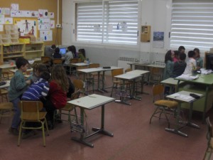 per grups, als ordinadors