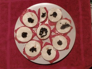 Tomàquet cor de bou amb formatge fresc i olivada
